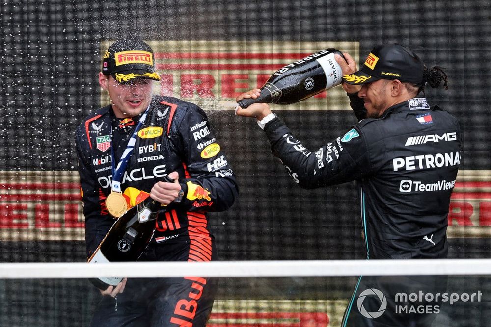 Max Verstappen, Red Bull Racing, 1st position, Lewis Hamilton, Mercedes-AMG, 3rd position, spray Champagne on the podium