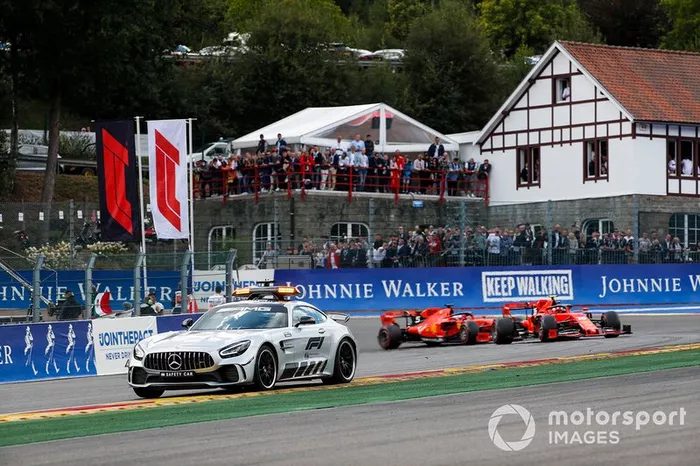 The safety car leads Charles Leclerc, Ferrari SF90 and Sebastian Vettel, Ferrari SF90
