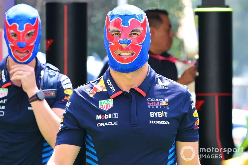 Sergio Perez, Red Bull Racing, his physical therapist Jo Canales arrive at the track wearing lucha libre masks