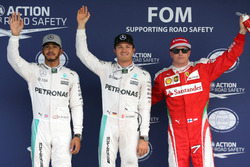 Qualifiche: i primi tre nel parco chiuso (da sx a dx): il secondo qualificato Lewis Hamilton, Merced