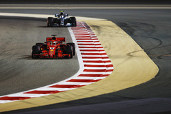 Sebastian Vettel, Ferrari SF71H, leads Valtteri Bottas, Mercedes AMG F1 W09