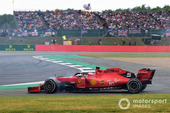 Sebastian Vettel, Ferrari SF90 after running into the back of Max Verstappen, Red Bull Racing RB15 