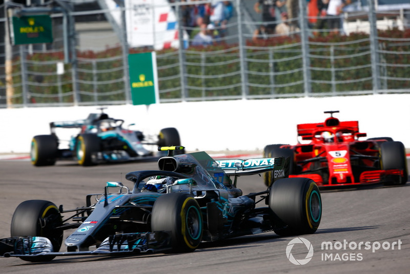 Valtteri Bottas, Mercedes AMG F1 W09, leads Sebastian Vettel, Ferrari SF71H, and Lewis Hamilton, Mercedes AMG F1 W09