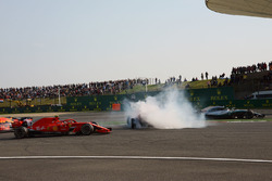 Max Verstappen, Red Bull Racing RB14 and Sebastian Vettel, Ferrari SF71H clash as Kimi Raikkonen, Ferrari SF71H and Lewis Hamilton, Mercedes-AMG F1 W09 EQ Power+ pass