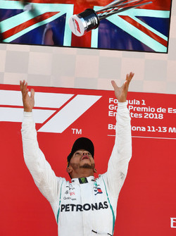 Race winner Lewis Hamilton, Mercedes-AMG F1 celebrates on the podium with the trophy