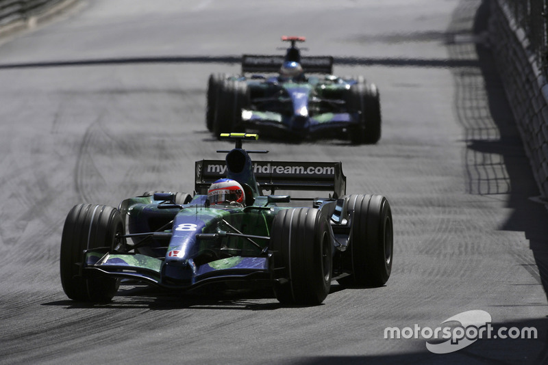 Rubens Barrichello, Honda RA107, 10th position, leads team mate Jenson Button, Honda RA107