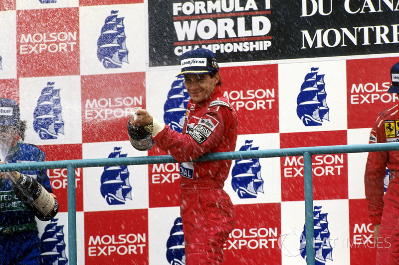 Podium: race winner Ayrton Senna, McLaren, second place Nelson Piquet, Benetton, third place Nigel Mansell, Ferrari