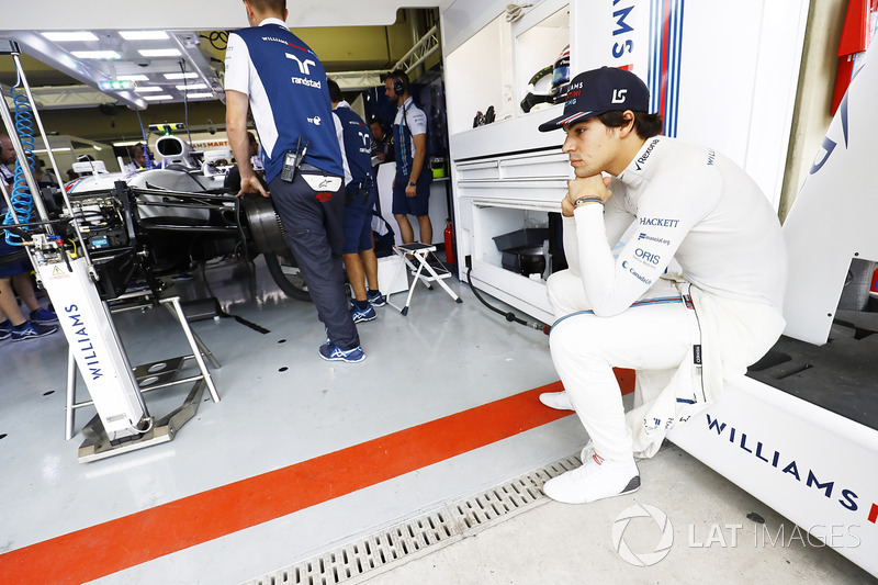 Lance Stroll, Williams FW40, waits for his car to be prepared in the garage