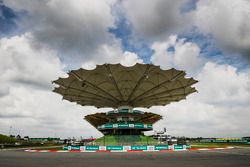 A covered grandstand at the final corner