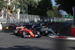 Kimi Raikkonen, Ferrari SF70H, Valtteri Bottas, Mercedes AMG F1 W08 at the start of the race