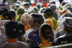 Fans endure the rain