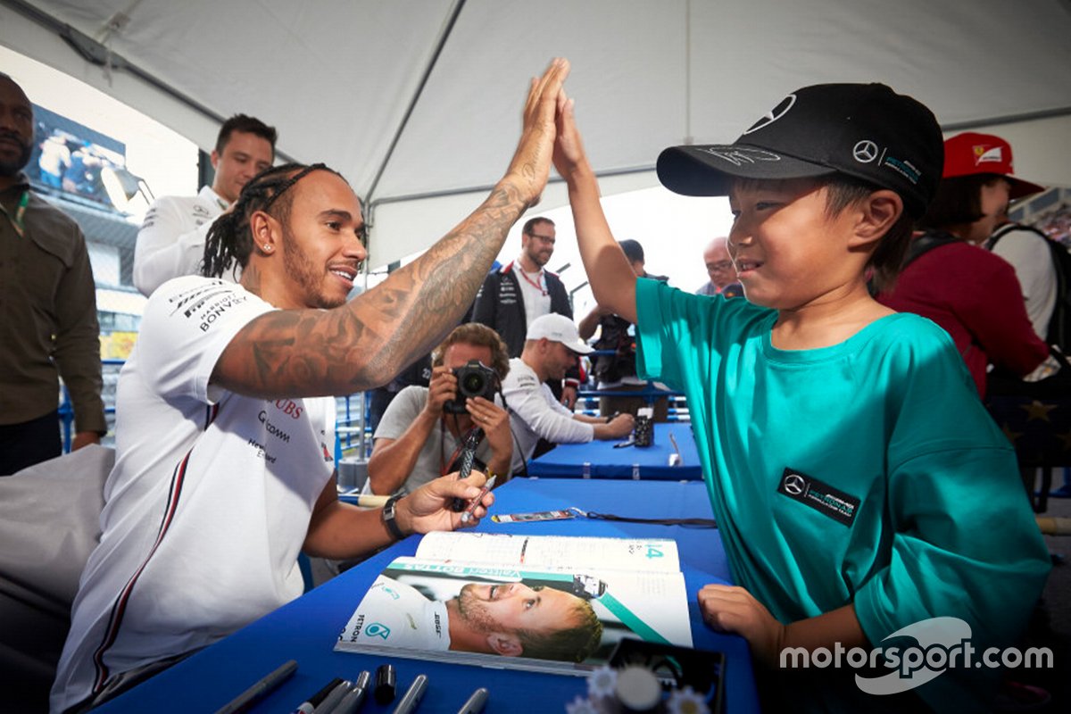 Lewis Hamilton, Mercedes with a young fan