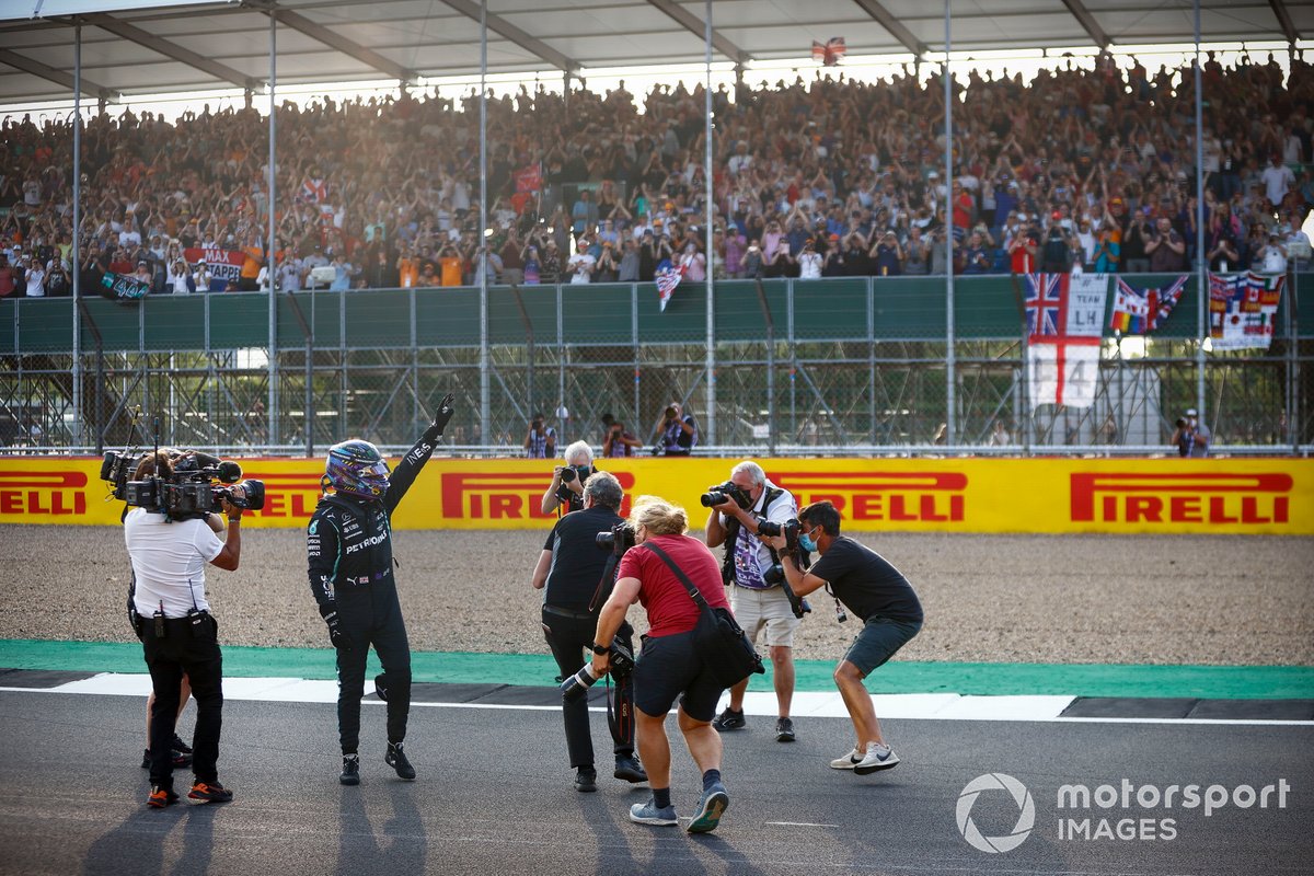 Lewis Hamilton, Mercedes, waves to fans after securing pole