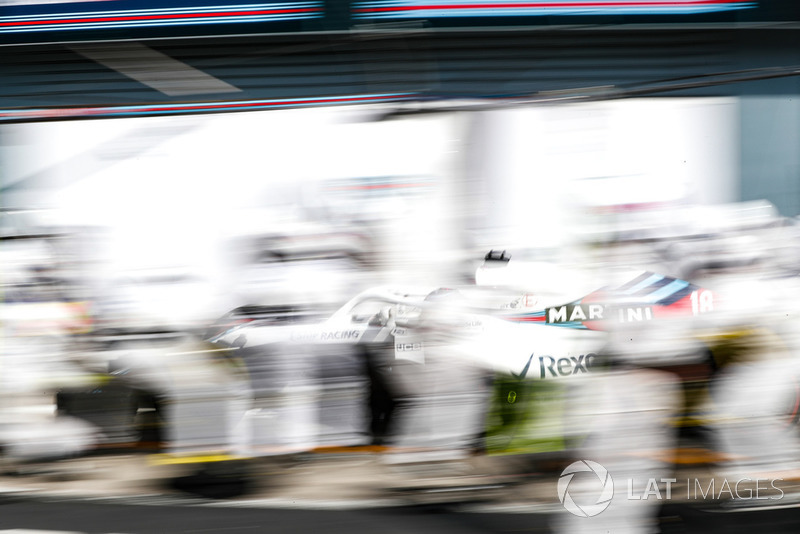 Lance Stroll, Williams FW41, makes a pit stop