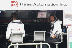 Haas team members on the pit wall