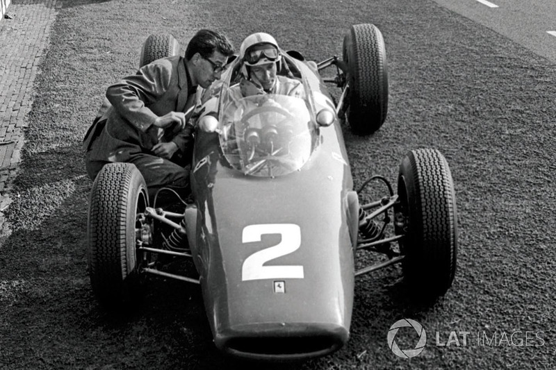 John Surtees, Ferrari 156, talks with Ferrari Chief Designer Mauro Forghieri