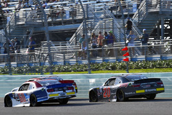 Ty Majeski, Roush Fenway Racing Ford and Christopher Bell, Joe Gibbs Racing Toyota