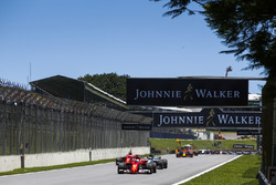 Sebastian Vettel, Ferrari SF70H, Valtteri Bottas, Mercedes AMG F1 W08, Kimi Raikkonen, Ferrari SF70H, Max Verstappen, Red Bull Racing RB13, the rest of the field at the start