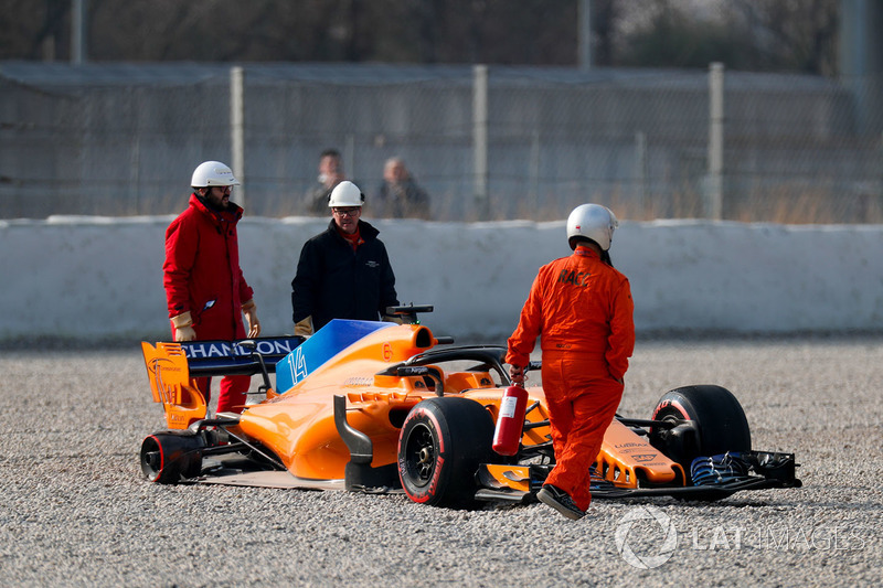 McLaren MCL33 of Fernando Alonso in the gravel trap after his rear wheel comes off