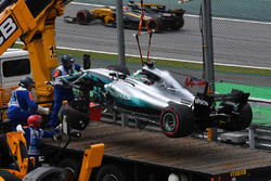 The crashed car of Lewis Hamilton, Mercedes-Benz F1 W08 is recovered in Q1