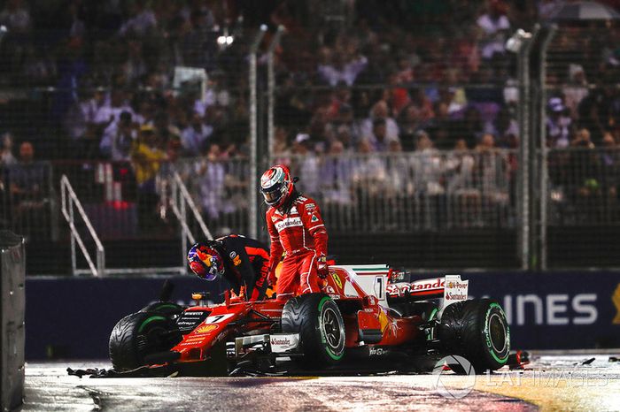  Kimi Raikkonen, Ferrari SF70H, Max Verstappen, Red Bull Racing RB13, climb out of their damaged cars