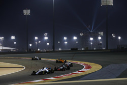 Lance Stroll, Williams FW41 Mercedes, leads Romain Grosjean, Haas F1 Team VF-18 Ferrari, Charles Leclerc, Sauber C37 Ferrari, and Stoffel Vandoorne, McLaren MCL33 Renault