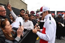 Charles Leclerc, Sauber signs autographs for the fans