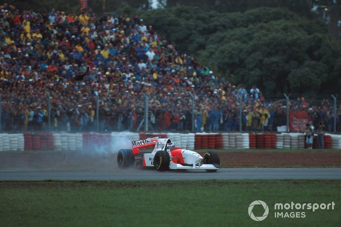 Mika Hakkinen, Mclaren  MP4-10 spins off after collision with Eddie Irvine