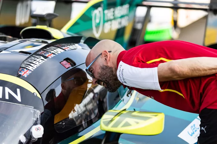  Ferrari engineers inspectingthe #007 Aston Martin Thor Team Aston Martin Valkyrie