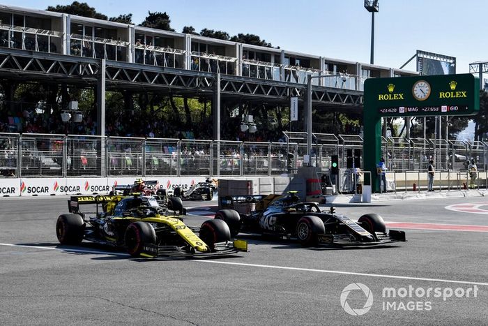 Nico Hulkenberg, Renault R.S. 19 y Kevin Magnussen, Haas F1 Team VF-19