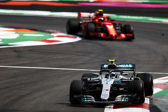 Valtteri Bottas, Mercedes AMG F1 W09 EQ Power+, leads Kimi Raikkonen, Ferrari SF71H