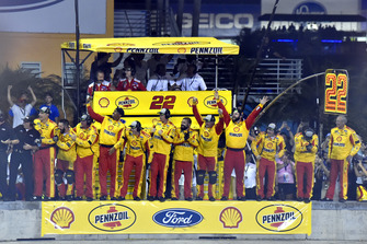 Joey Logano's, Team Penske, Ford Fusion Shell Pennzoil crew members celebrate the race win and the Monster Energy Cup Championship