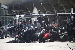 Jenson Button, McLaren MP4-31 pit stop