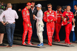 Pole sitter Valtteri Bottas, Mercedes AMG F1 celebrates in parc ferme with Matteo Bonciani, FIA Medi