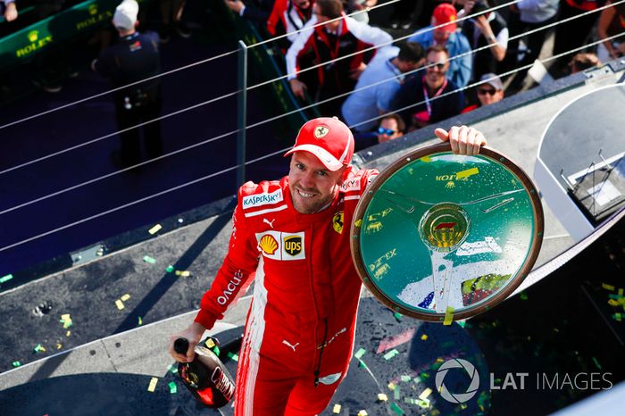 Sebastian Vettel, Ferrari, celebrates victory on the podium