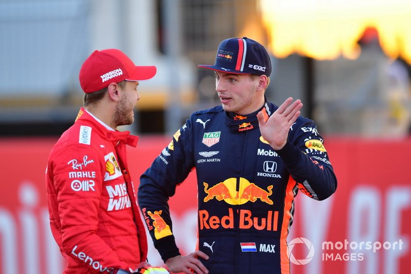 Sebastian Vettel, Ferrari, with Max Verstappen, Red Bull Racing