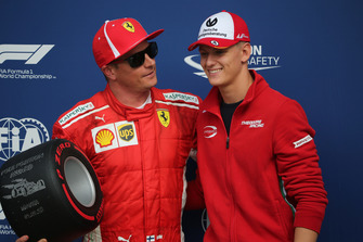 Mick Shcumacher presents the Pirelli Pole Position Award to Kimi Raikkonen, Ferrari