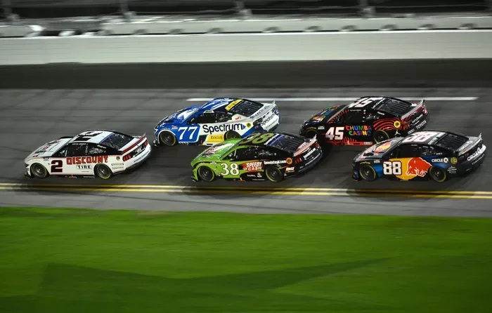 Austin Cindric, Team Penske Ford, Carson Hocevar, Spire Motorsports Chevrolet, Zane Smith, Front Row Motorsports Ford, Tyler Reddick, 23XI Racing Toyota