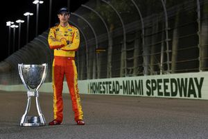 Joey Logano, Team Penske, Ford Fusion Shell Pennzoil with his Championship trophy