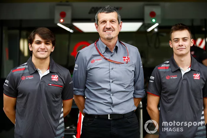 Guenther Steiner, Team Principal, Haas F1, poses with test and development drivers Pietro Fittipaldi and Louis Deletraz.