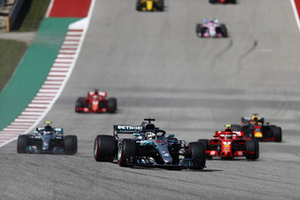 Lewis Hamilton, Mercedes AMG F1 W09 EQ Power+, leads Kimi Raikkonen, Ferrari SF71H, Valtteri Bottas, Mercedes AMG F1 W09 EQ Power+, Daniel Ricciardo, Red Bull Racing RB14, Sebastian Vettel, Ferrari SF71H, and the rest of the field on the formation lap