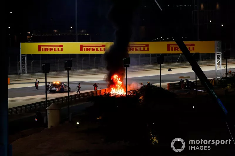 The crashed car of Romain Grosjean, Haas VF-20 on fire