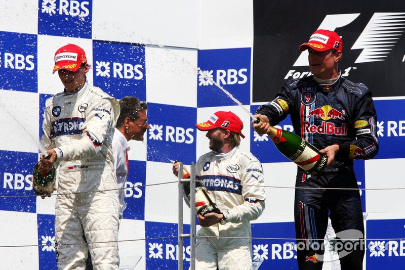 Race winner Robert Kubica, BMW Sauber F1 with Dr. Mario Theissen, BMW Sauber F1 Team Principal; Nick Heidfeld, BMW Sauber F1 and David Coulthard, Red Bull Racing