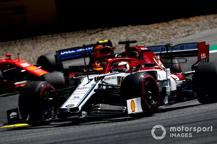Kimi Raikkonen, Alfa Romeo Racing C38, Lando Norris, McLaren MCL34