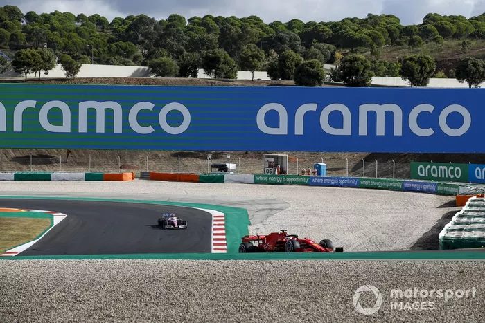 Sebastian Vettel, Ferrari SF1000 and Lance Stroll, Racing Point RP20 