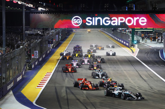 Lewis Hamilton, Mercedes AMG F1 W09 EQ Power+, leads Max Verstappen, Red Bull Racing RB14, and Sebastian Vettel, Ferrari SF71H, at the start of the race
