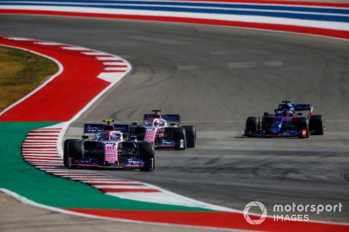 Lance Stroll, Racing Point RP19, leads Sergio Perez, Racing Point RP19, and Daniil Kvyat, Toro Rosso STR14