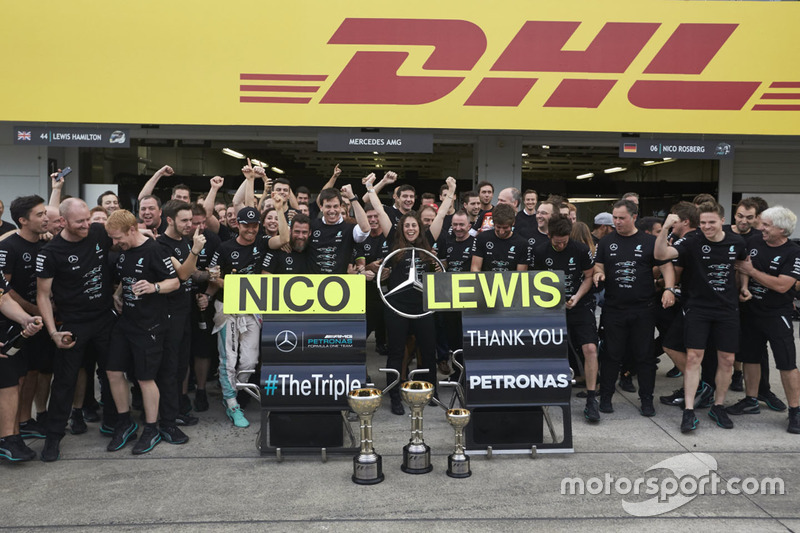 Nico Rosberg, Mercedes AMG F1 and team mate Lewis Hamilton, Mercedes AMG F1 celebrate the Constructo