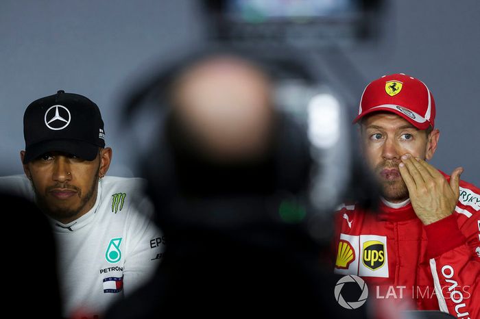 Lewis Hamilton, Mercedes-AMG F1 y Sebastian Vettel, Ferrari 