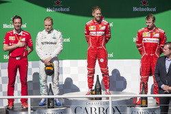 Podium: winner Sebastian Vettel, Ferrari, second place Valtteri Bottas, Mercedes AMG F1, third place Kimi Raikkonen, Ferrari, Giuseppe Vietina, Ferrari